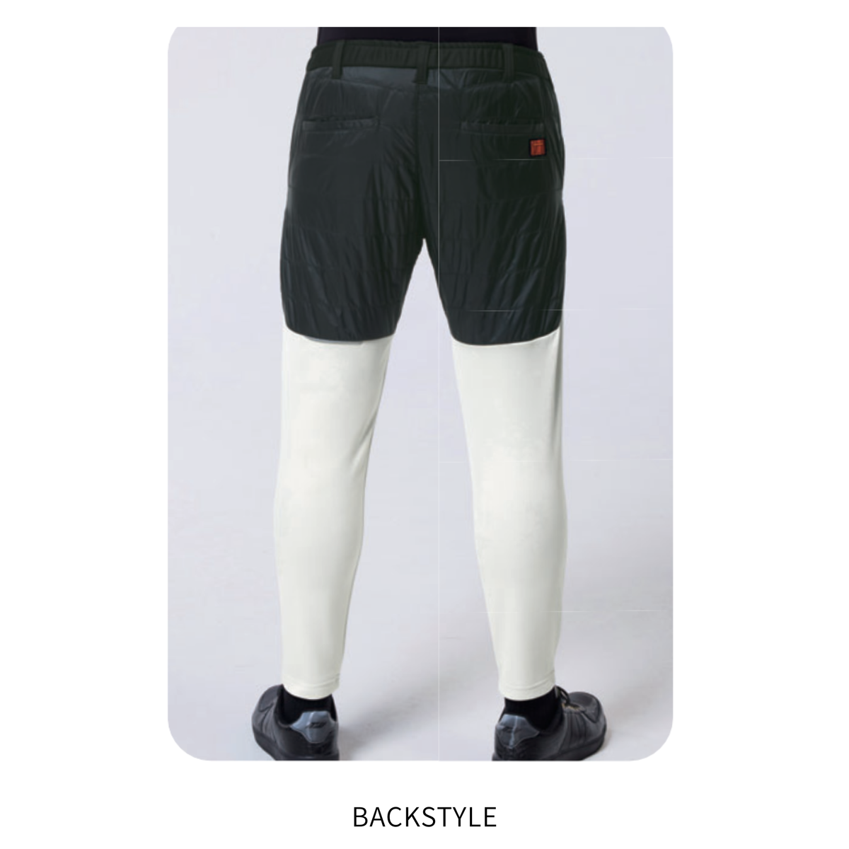 アタックベース（ATACK BASE）49582 HUMMER レヴスキンズインサレーションパンツ 07.グレーのバックスタイル着用画像。腰まわりと太もも部分にブラックの中綿生地、膝下にグレーのストレッチ生地を採用。後ろポケットやウエストゴム仕様を確認できる秋冬用防寒ワークパンツ。
